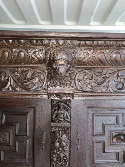17th Century Dark Oak  Jacobean Cupboard With Book Of Genesis Carvings Dated Anno 1609