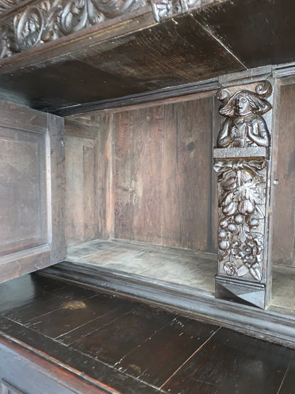 17th Century Dark Oak  Jacobean Cupboard With Book Of Genesis Carvings Dated Anno 1609