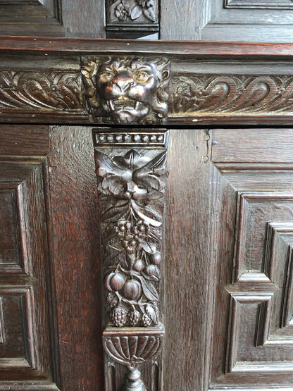 17th Century Dark Oak  Jacobean Cupboard With Book Of Genesis Carvings Dated Anno 1609